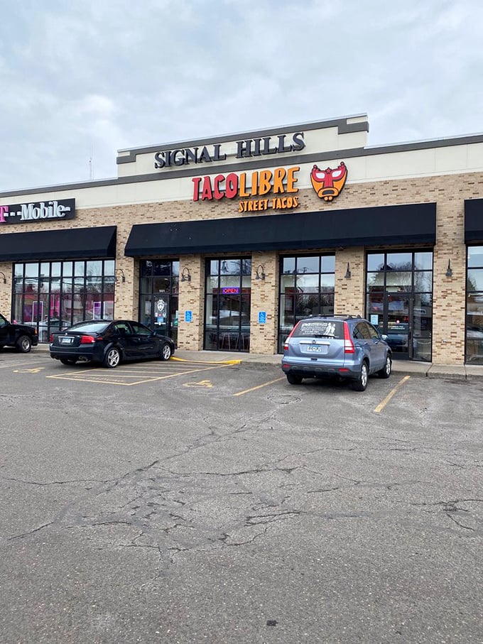 Wrestle with flavor at Taco Libre! This luchador-themed taqueria serves up tacos so good, they should come with their own championship belt. Photo credit: Preston B.