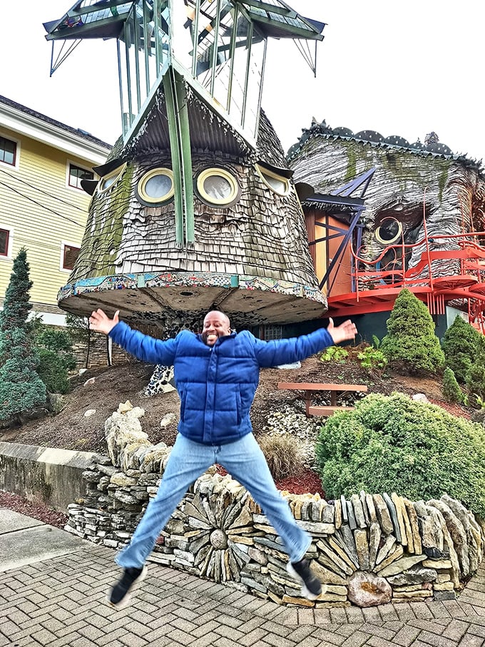 Who needs Disneyland when you've got this in your backyard? This jubilant visitor's reaction perfectly captures the childlike wonder the Mushroom House inspires.