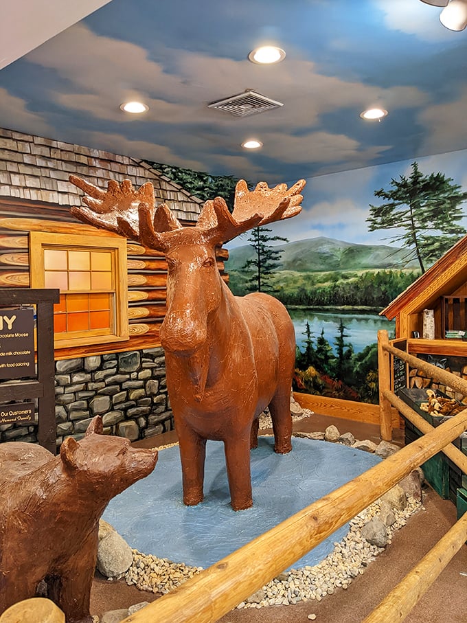 Who needs postcards when you can snap a selfie with a life-sized chocolate moose? Road trip gold!