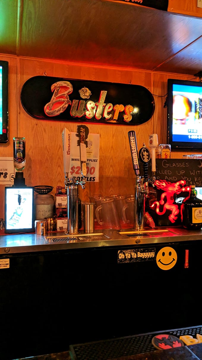 Neon lights, big bites! Buster's after-dark glow promises a night of tasty adventures and good times.