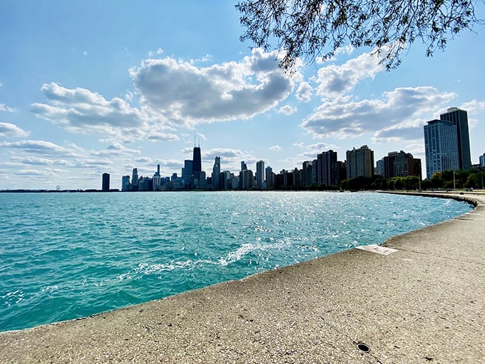 Skyscrapers play lifeguard to sun-seekers and volleyball enthusiasts. Chicago's sandbox is open for business, and the skyline's got front-row seats! 