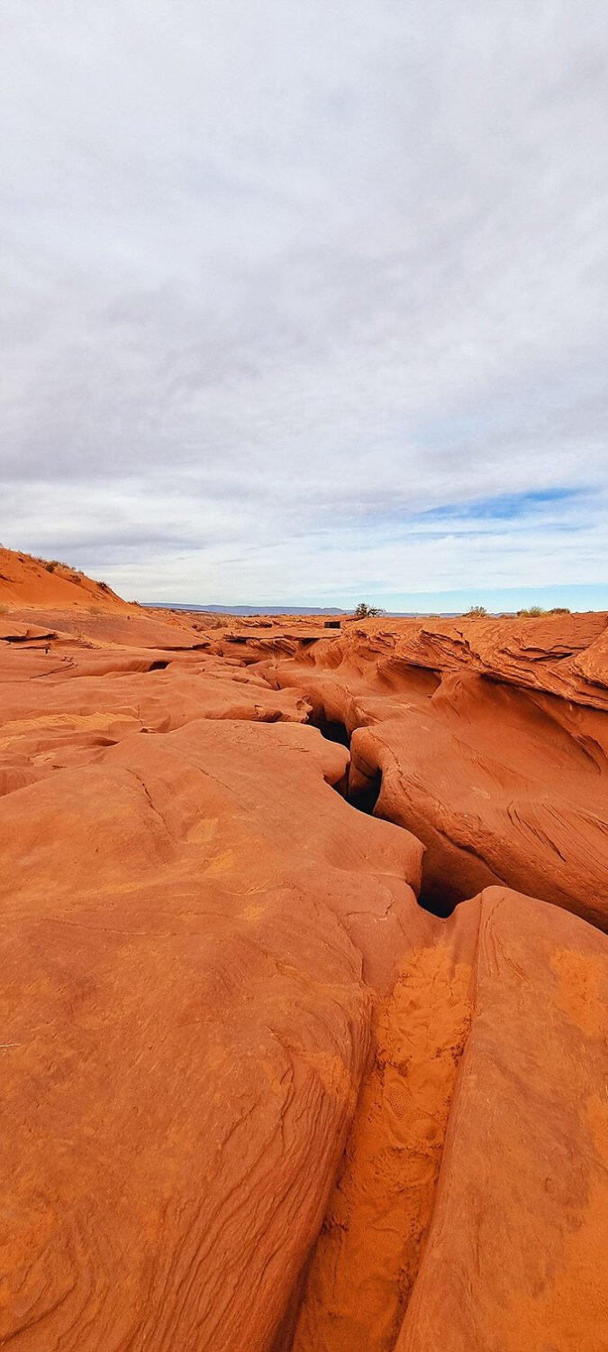 Antelope Canyon: Nature's funhouse mirror, where the walls swirl like a Georgia O'Keeffe painting come to life.