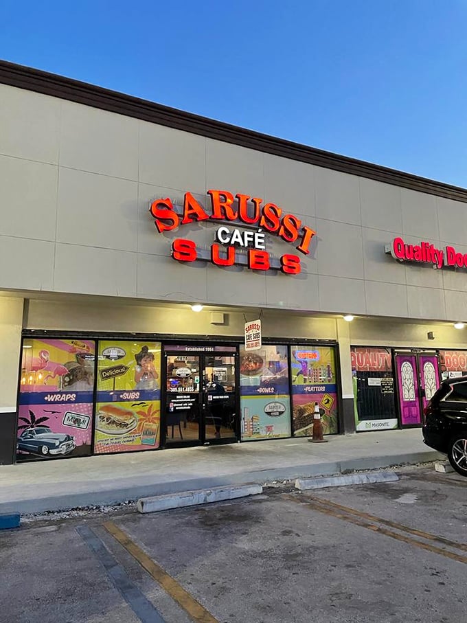 Neon lights, big bites! Sarussi's sign promises sandwiches that are larger than life and twice as delicious.