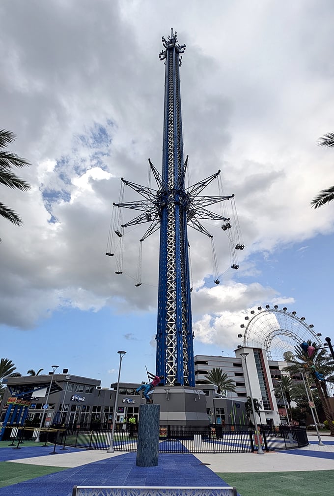 Reaching for the sky! The Orlando Starflyer isn't just a ride; it's a full-body workout for your courage muscles.