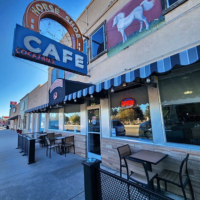 Giddy up to the Horseshoe Cafe, where the neon sign is brighter than a prospector's eyes at a gold strike. Cowboy-approved comfort food awaits!