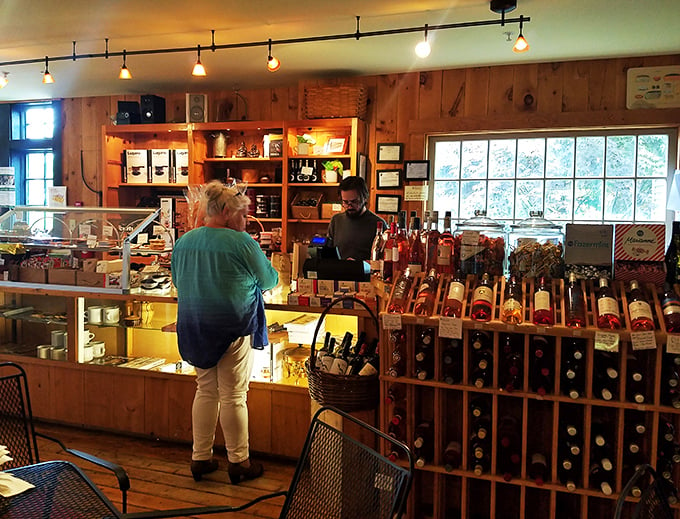 Service with a smile! The Cheese Iron's counter is where dairy dreams come true, staffed by cheese whizzes ready to guide your taste adventure.