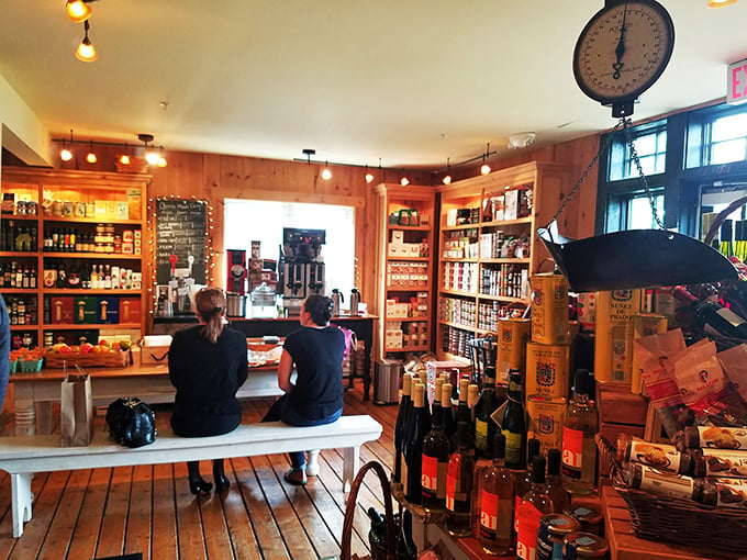 Decisions, decisions! These patrons are deep in cheese contemplation, like scholars pondering the great questions of the culinary universe.