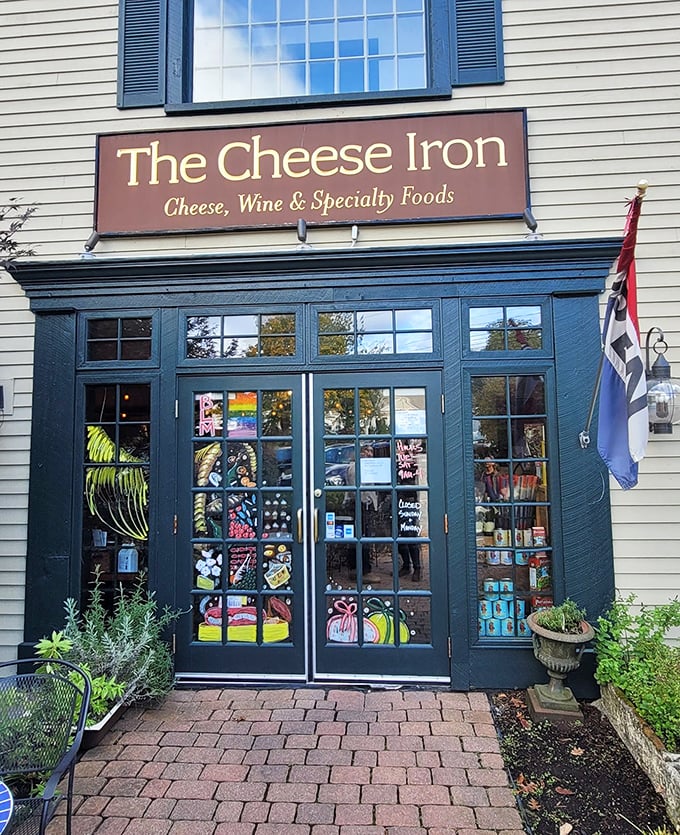 Step into flavor paradise! The Cheese Iron's entrance is a portal to gourmet bliss, with windows that tease like a culinary peep show.