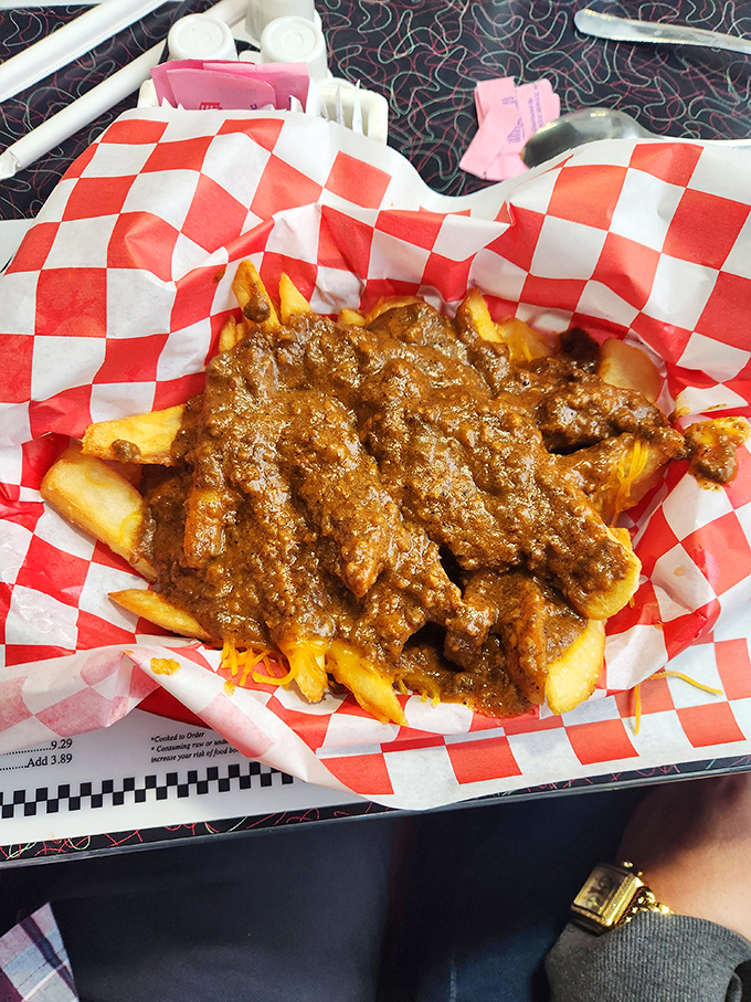 Chili fries: Where 'messy' meets 'marvelous'! This basket of joy is like a warm hug for your taste buds. Fork optional, napkins mandatory.