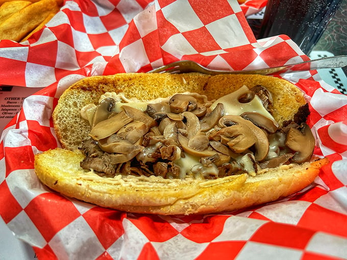 Hoagie heaven on a checkered tablecloth! This sandwich is stacked higher than your grandpa's tales of walking to school uphill both ways.