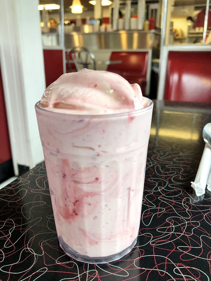 Pretty in pink and oh-so-sweet! This cherry shake is giving us major "Grease" vibes. We'd happily hand-jive our way through brain freeze for this beauty.