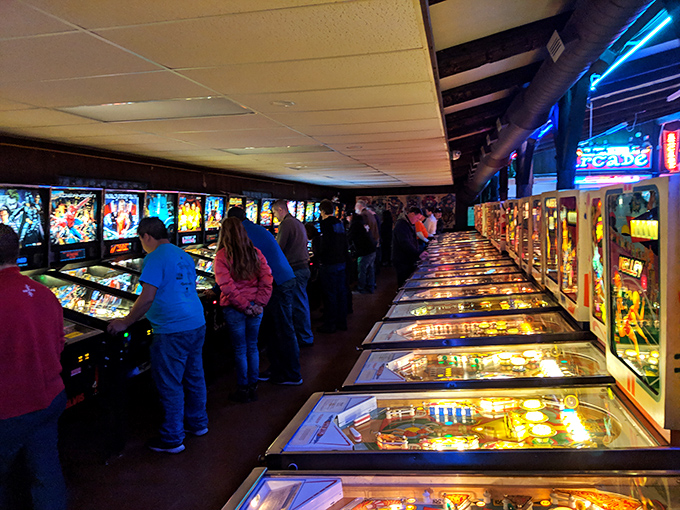 Rows of pinball machines stand at attention, like an army of time-traveling sentinels guarding your childhood memories.