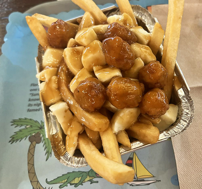 Popcorn chicken poutine: because sometimes you need to turn your comfort food up to eleven. It's a party in a basket, and you're invited!