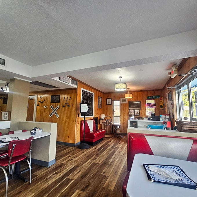 Step into a time machine of taste! This cozy interior, with its wood paneling and retro booths, serves up nostalgia alongside mouthwatering meals.