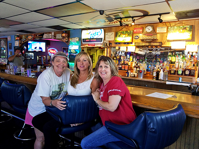 The gang's all here! Nothing says "local watering hole" quite like friends gathered at the bar, solving the world's problems one pint at a time.