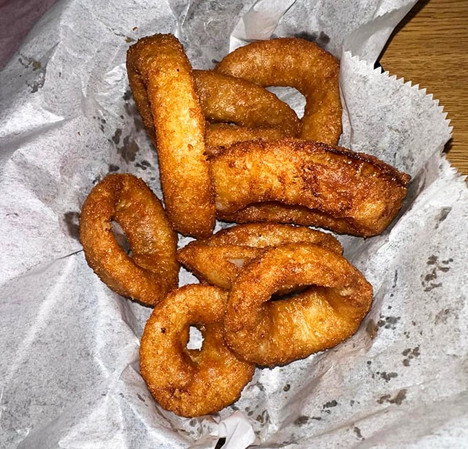 Onion rings so perfectly golden, they belong in Fort Knox. Crispy, savory, and addictive – resistance is futile!