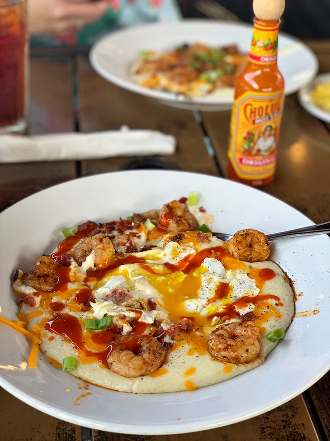 Shrimp and grits: a Southern classic that's got more soul than James Brown. This dish is ready for its close-up, Mr. DeMille!