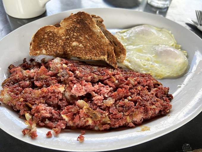 Corned beef hash: where meat meets potato in a dance of deliciousness. This plate is the breakfast equivalent of a warm hug.