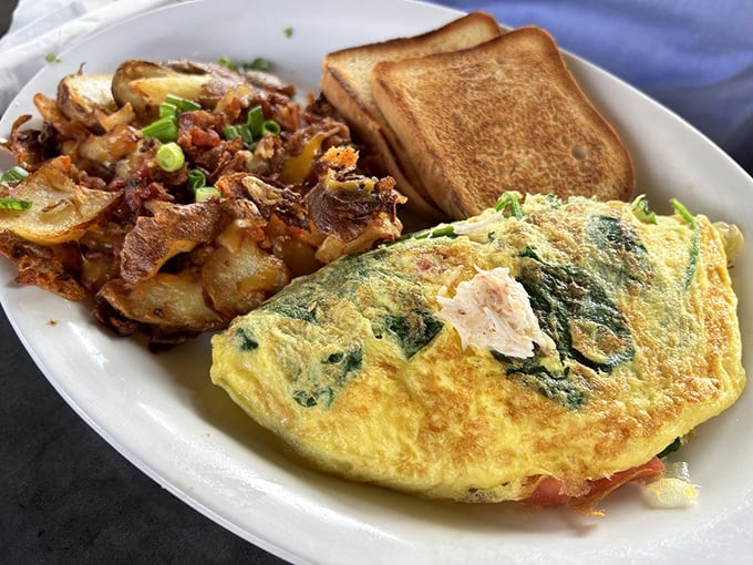 Omelet perfection meets crispy home fries in a breakfast duet that'll make your taste buds sing. It's the Sonny and Cher of morning meals!