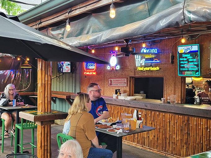 Tiki-tastic outdoor oasis! This bamboo bar brings a touch of tropical flair to the Midwest. Who needs a beach when you've got breaded pork?