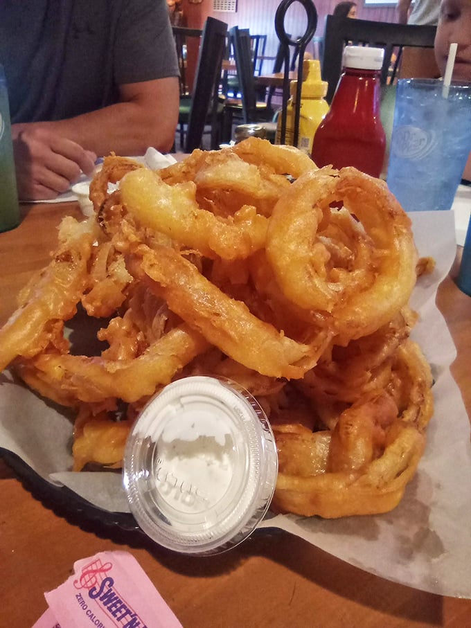 Onion ring mountain with a creamy summit! These crispy circles are stacked higher than my unread email inbox. Deliciously dippable!