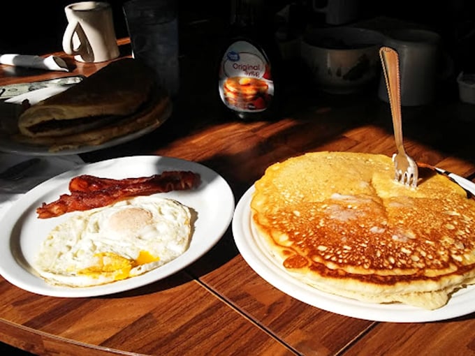 Holy flapjacks, Batman! These pancakes are so massive, they make regular ones look like silver dollar coins. Syrup surfing, anyone?