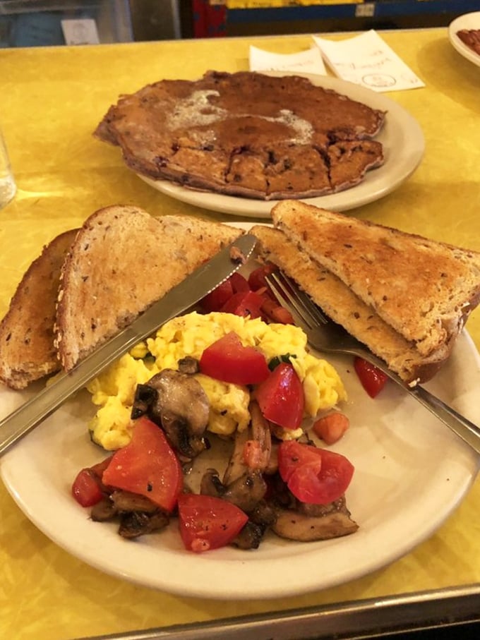 Summer on a plate! This vibrant scramble and those bodacious blackberry pancakes are like a sunrise for your taste buds.