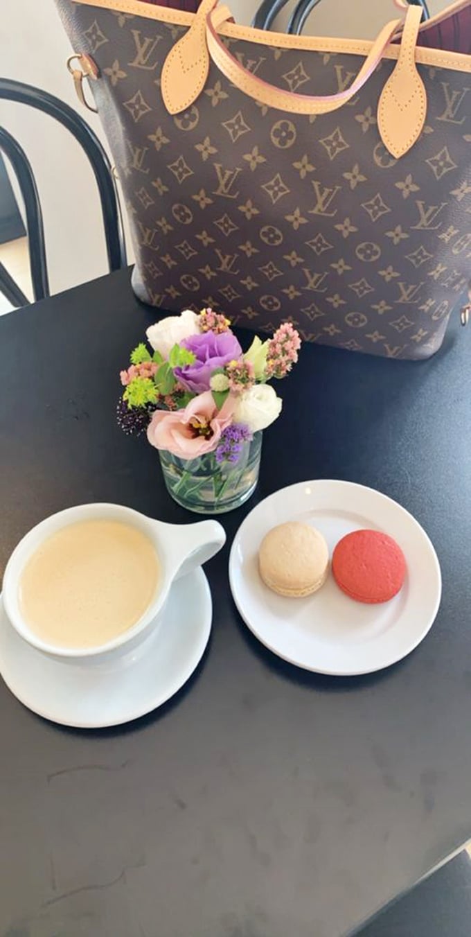 Chai and macarons: a match made in heaven. Add a designer bag, and you've got the ultimate "treat yo'self" trifecta.