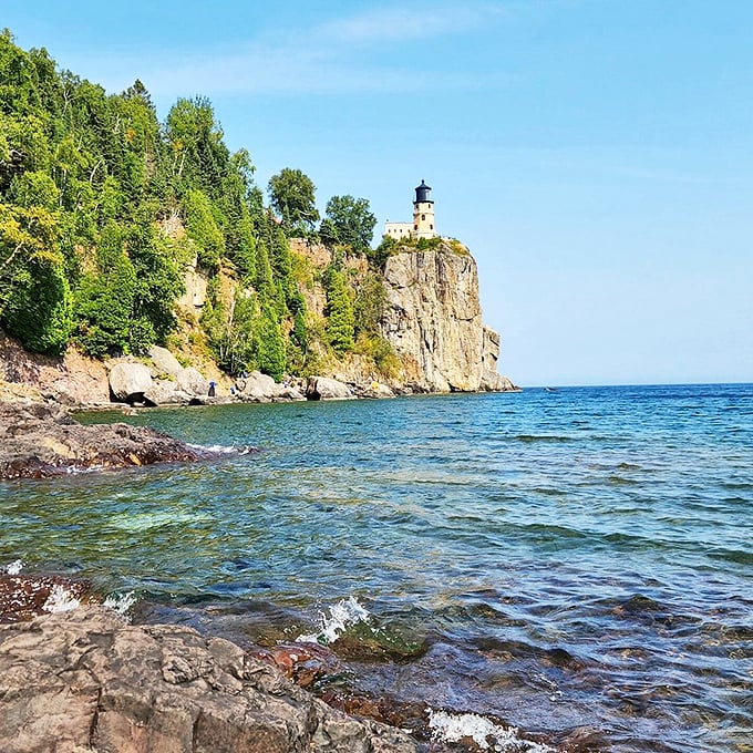 Crystal-clear waters and a lighthouse on a cliff? It's like Mother Nature decided to show off her best side.