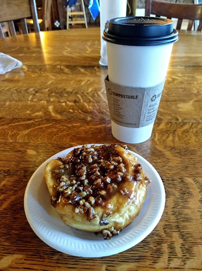 The ultimate power couple: a steaming cup of joe and a caramel-pecan roll. Name a more iconic duo – I'll wait.