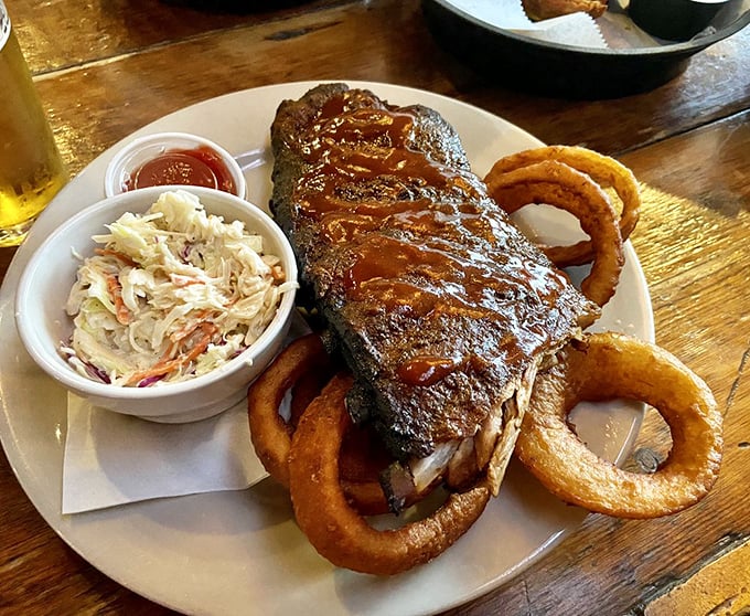 Half rack of ribs? More like half rack of heaven. Fall-off-the-bone tender and slathered in sauce, it's caveman cuisine at its finest.