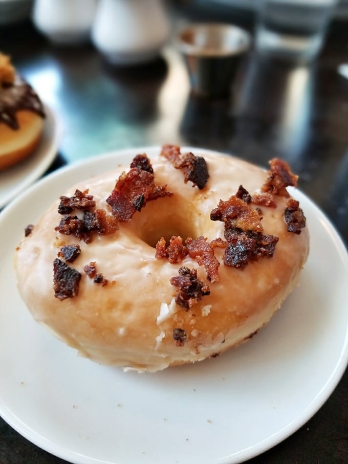 Bacon on a donut? It's not just breakfast anymore, it's a flavor revolution! Your taste buds will thank you for this sweet and savory masterpiece.