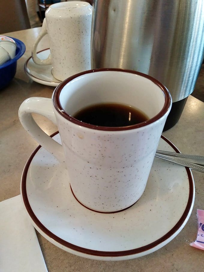 The elixir of life, diner-style. This isn't just coffee; it's liquid motivation in a mug, ready to transform you from zombie to functioning human. Resistance is futile.