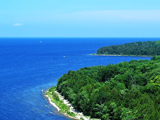 Bird's eye bliss: A view so breathtaking, even drones get jealous. Peninsula State Park from above - where blue meets green in perfect harmony.