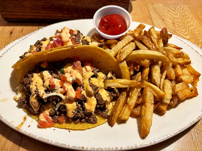 These tacos aren't just dinner, they're an event. Loaded with goodness and paired with fries that could make a French chef weep with joy. Photo credit: L S