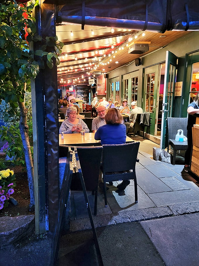 String lights transform the evening into magic, creating the perfect backdrop for memorable meals and even better conversations. Photo credit: Marie