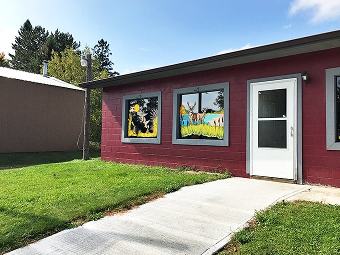 Whimsical windows and hearty eats! This little red diner serves up charm faster than you can say 'pass the syrup.'