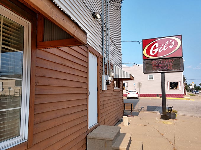 Step back in time! Gil's neon sign glows like a beacon of nostalgia, promising comfort food that'll hug your taste buds.