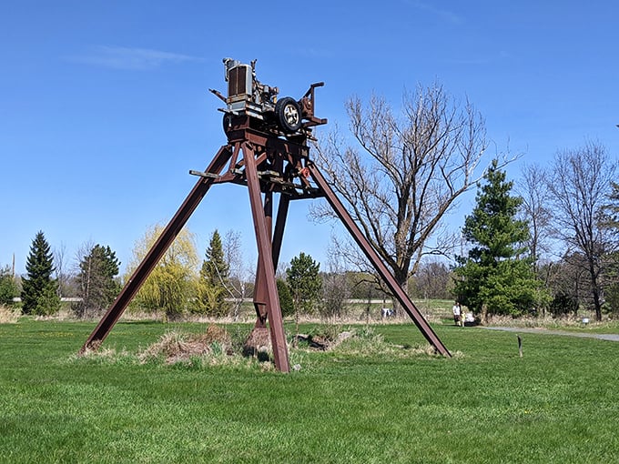 "Is it a bird? Is it a plane? No, it's a… car on stilts?" This towering sculpture proves that even automobiles can reach new heights in the world of art.