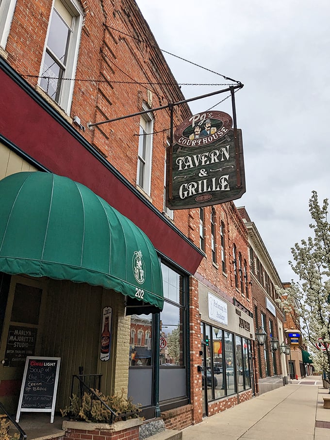 A brick-and-mortar time machine: PJ's Courthouse Tavern stands proudly on the corner, its green awnings beckoning like a culinary siren song to hungry passersby.