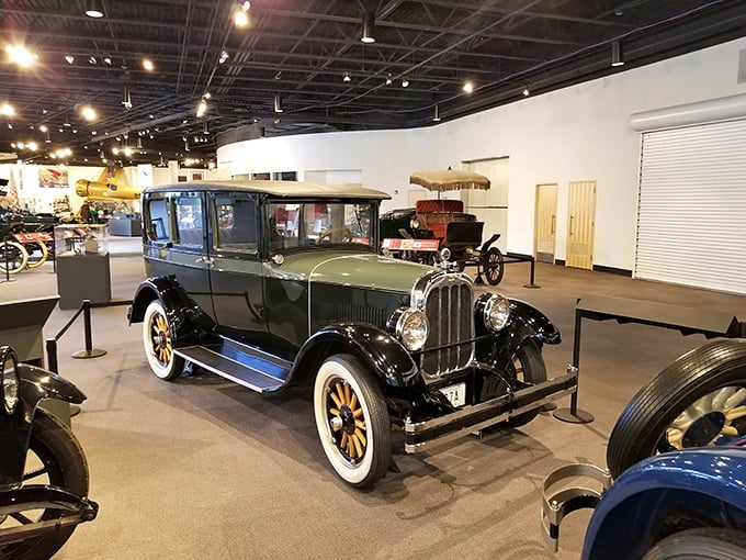 Step into a time machine on wheels! This 1920s beauty isn't just a car, it's a rolling history lesson with chrome trim.