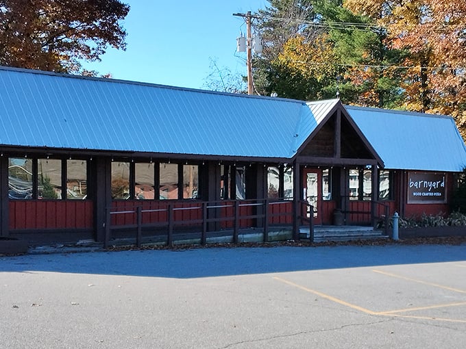 A rustic red barn meets cozy diner? Barnyard Wood Crafted Pizza's exterior promises a feast that's anything but farmyard fare!