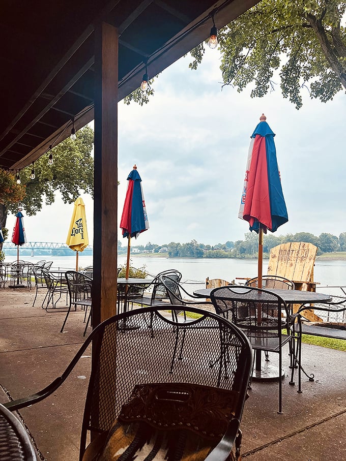 A red-hot destination! The Boat House's vibrant exterior and blooming flower beds invite you to dive into a world of riverside dining delights.