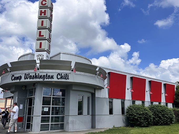 Behold the beacon of chili salvation! Camp Washington's iconic sign stands tall, promising comfort food that's been warming Cincinnati hearts since 1940.