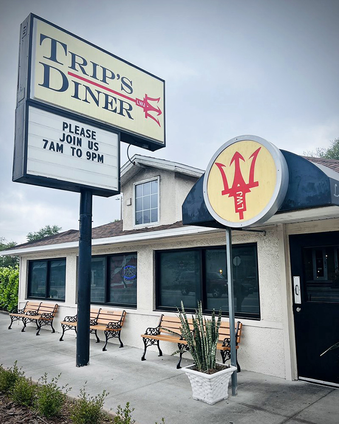 Welcome to flavor town! Trip's Diner's exterior promises a journey into comfort food paradise, complete with a side of humor and fat-free lettuce.