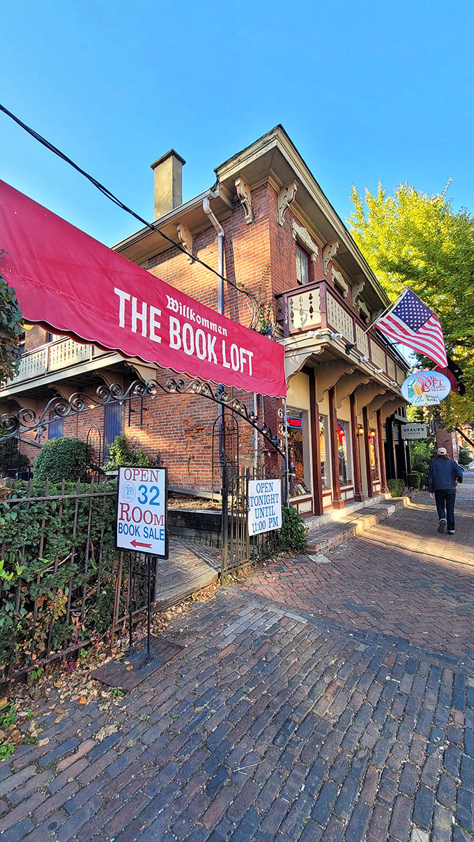 A bookworm's paradise awaits! The Book Loft's charming exterior beckons with its red awning and promise of literary treasures within.