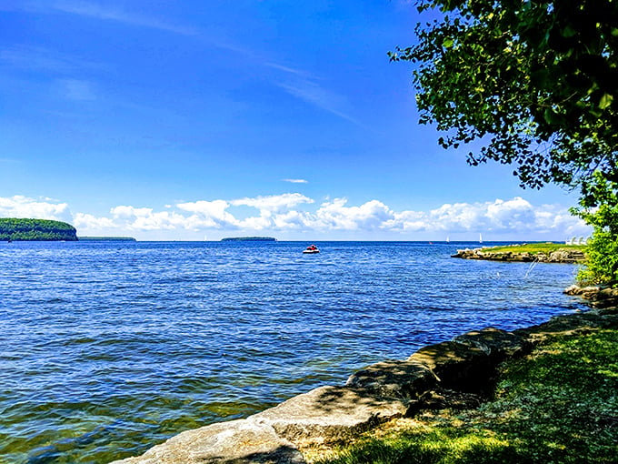 Nature's canvas unfolds: A view that'll make you forget your Instagram filters exist. Green Bay's waters stretch to the horizon, inviting adventure and serenity in equal measure.