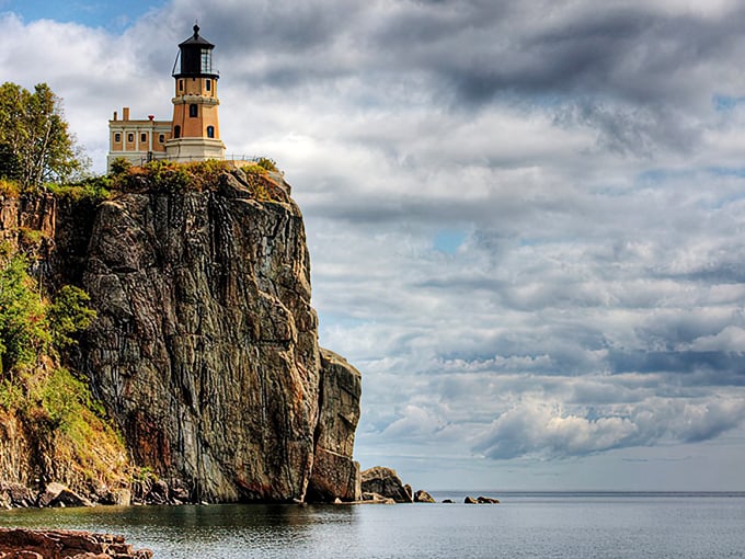 Sunset perfection! Split Rock Lighthouse stands sentinel over Lake Superior, a postcard come to life that'll make your Instagram followers green with envy.