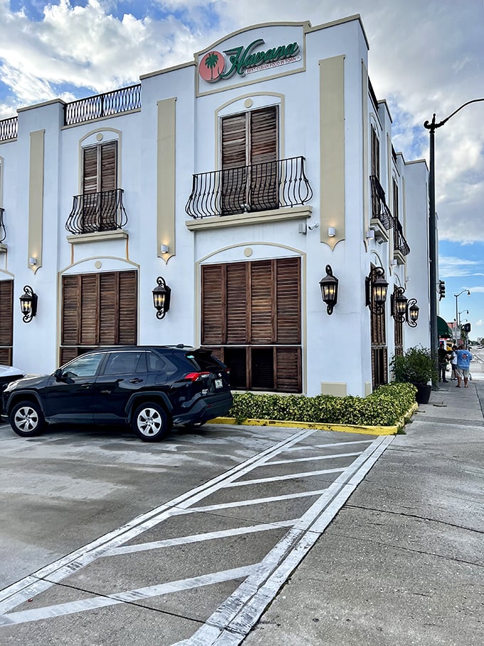 A slice of Havana in the heart of West Palm Beach! This charming exterior is like a postcard come to life, minus the international postage.