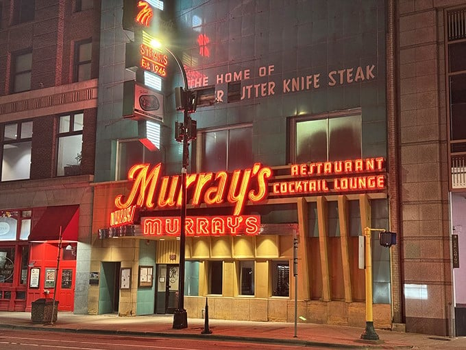 Neon dreams come true! Murray's iconic sign beckons like a lighthouse for the hungry, guiding you to a steakhouse oasis in downtown Minneapolis.